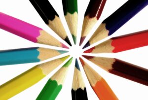 A set of colouring pencils in a cercle. | Spanish translation editing services for English or French to Spanish translations. Adding colour and accuracy to your translated copy.