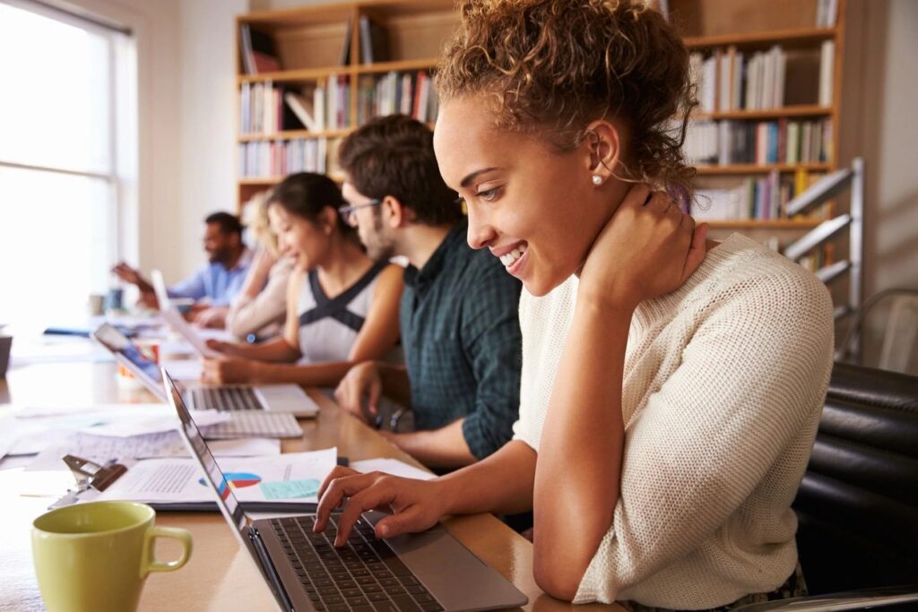 Group of students studying at a library or study room | Proofreading of Spanish teaching materials